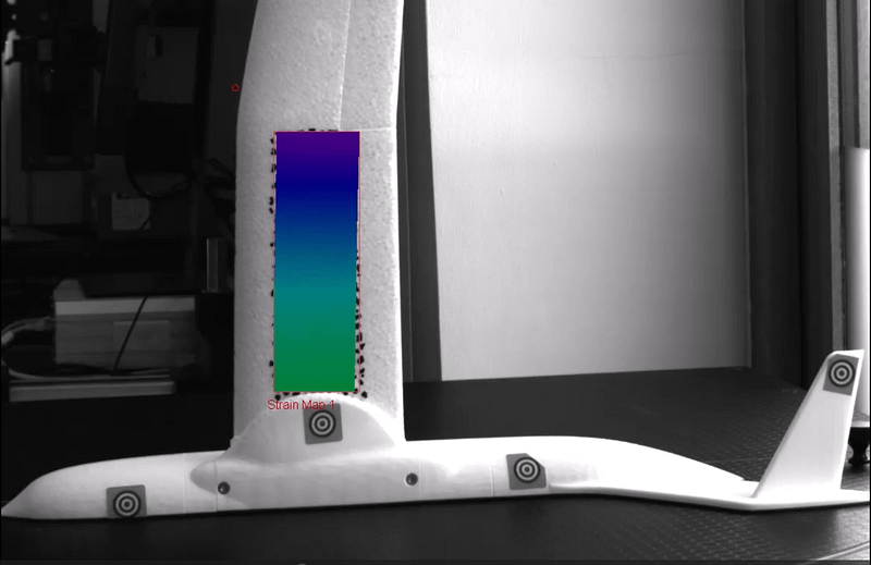 An image taken from Imetrum's digital image correlation software, Video Gauge, showing a half plane wing model with a strain map on.